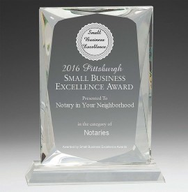 Crystal Award Plaque Inscribed With "Small Business Excellence Award" Showcasing Recognition Of Outstanding Achievement.